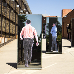 South Africa, Johannesburg - 30 March, 2016: The entrance to Apartheid Museum. Exhibition is dedicated to regime apartheid and the 20th century history of South Africa. Artistic retouching.