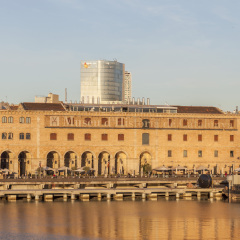 BARCELONA,SPAIN-DECEMBER 3,2012: Port, Palace, Palau de Mar, old warehouses. Space with restaurants and History Museum of Catalonia. Port Vell, Barcelona.