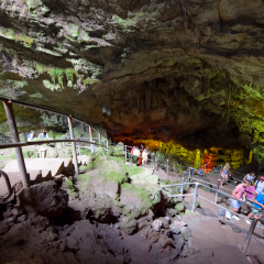 CRETE,GREECE-JULY 21: Tourists go down to the Psychro Cave (Cave of Zeus) on July 21,2014 on the Crete island in Greece.