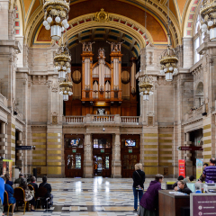 GLASGOW, SCOTLAND - JULY 16, 2016:  Central hall with the Pipe Organ of the Kelvingrove Art Gallery and Museum, Argyle Street, Glasgow. It's a popular attraction for the tourists