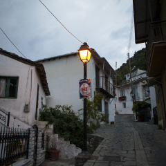 THASOS ISLAND, GREECE - SEPTEMBER, 22, 2015: Traditional houses on a street in Panagia village, Thasos island, Greece