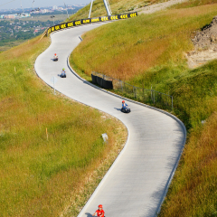 Canada Olympic Park, Calgaary, Alberta, Canada. Aug 25 2013. A group was racing down the hill in luge.