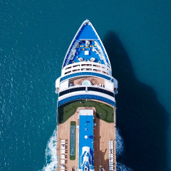 Large Cruise ship sailing across The Mediterranean sea - Aerial image