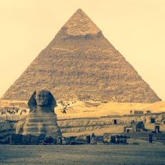 Pyramid of Khafre (Chephren) and Great Sphinx of Giza, famous egyptian landmarks in Cairo. Sphinx is a mythical creature with lion body in ancient culture of Egypt and oldest monumental sculpture.