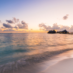 Luxury resort in the Indian Ocean. Relax evening, sunset over the ocean. Maldives. Ari Atoll.