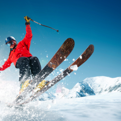 Skiing. Jumping skier. Extreme winter sports.