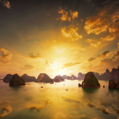 Sunset over the islands of Halong Bay in northern Vietnam. Amazing landscape background