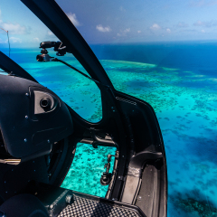 Helicopter ride over Moore Reef, part of the outer Great Barrier Reef in Australia