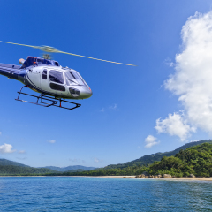 Helicopter flying over deserted Island in Angra dos Reis, Rio de Janeiro