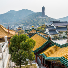 Chinese traditional royal style colorful temples in Putuoshan mountains, Zhoushan Islands,  a renowned site in Chinese bodhimanda of the Guanyin 