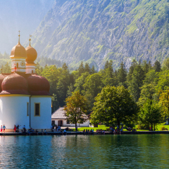 Bavaria, Germany - August 8, 2015: Mountain scenery with Lake Konigssee with world famous St Bartholomae (St. Bartholomew) pilgrimage church, Nationalpark Berchtesgadener Land, Bavaria, Germany