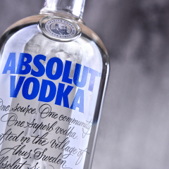 POZNAN, POLAND - MAR 30, 2018: Bottle of Absolut Vodka, a brand of vodka produced in Sweden. Owned by French group Pernod Ricard it is one of the largest brand of alcoholic spirits in the world