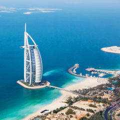 DUBAI, UAE - JANUARY 20: Burj Al Arab hotel on January 20, 2011 in Dubai, UAE. Burj Al Arab is a luxury 5 star hotel built on an artificial island in front of Jumeirah beach. Helicopter view