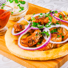 Grilled meat on pita bread