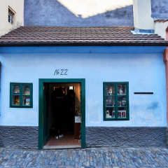 Prague, Czech Republic - October 31, 2018 Front view of the house used by the Czech writer Franz Kafka located at number 22 in Golden Lane Street.  Franz Kafka wrote part of his stories in this house.