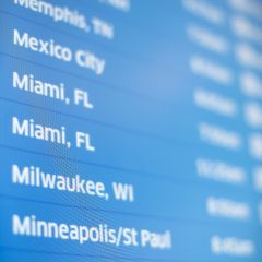 Detail image of flight departure board in an american Airport