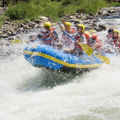 People whitewater rafting