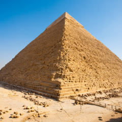 Elevated perspective of the corners of the Great Pyramid of Khafre, the largest of Egyptian pyramids seen from rear with a clear blue sky. Horizontal copy space