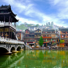 HUNAN, CHINA - JUNE 16, 2014 : Old houses in Fenghuang county in Hunan, China. The ancient town of Fenghuang was added to the UNESCO World Heritage Tentative List in the Cultural category.
