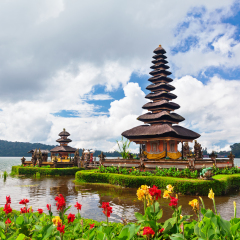 Temple Pura Ulun Danu Beratan. Traditional Balinese temple on lake. Place of festivals, famous travel attraction, day tour destination in Bali island, Indonesia. Indonesian people culture background.
