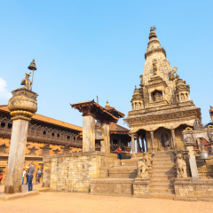 Bhaktapur, Nepal - October 31, 2013: Close view of undamaged Vatsala Durga Temple and 55 Window Palace on blue sky day before 2015 Gorkha earthquake damage