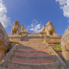 BHAKTAPUR, NEPAL - NOVEMBER 04, 2017: Stone guardians on the stairs of the Nyatapola temple on Taumadhi Tole, BHAKTAPUR, NEPAL