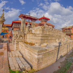 BHAKTAPUR, NEPAL - NOVEMBER 04, 2017: Stone guardians on the stairs of the Nyatapola temple on Taumadhi Tole, BHAKTAPUR, NEPAL, fish eye effect
