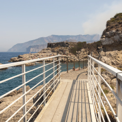 bridge crossing along the coast at Bagni della Regina Giovanna in Sorrento.Naples_Italy
