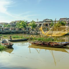 
boats in the river Thu bon in the Hoi an town in Vietnam.