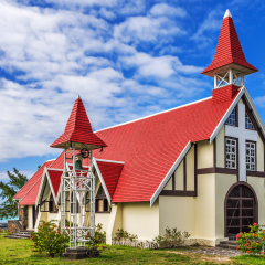 Notre Dame Auxiliatrice Church with distinctive red roof at Cap Malheureux, Mauritius, Indian Ocean