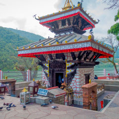 POKHARA, NEPAL - SEPTEMBER 04, 2017: Unidentified people walking around of Tal Barahi Temple, located at the center of Phewa Lake, is the most important religious monument of Pokhara