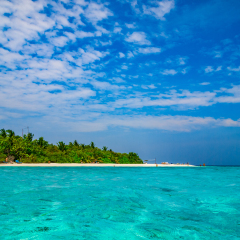 Tropical island vacation image, turquoise blue crystal clear water sea