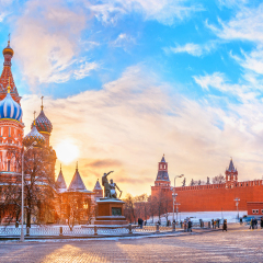 View of Kremlin and Cathedral of St. Basil at the Red Square at sunset winter in Moscow, Russia
