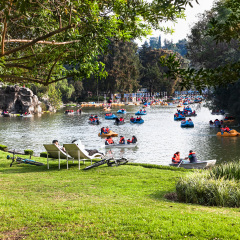 MEXICO CITY, MEXICO - DEC 6, 2015: The lake of the Chapultepec Park, the biggest park in Mexico City  with boat for ricreation on Dec 6, 2015, Mexico.