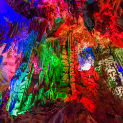 Guilin, China, 20 Jun 2014: Beautiful light up of limestone cave interior at Guilin Silver Caves.