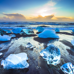 Ice rock with black sand beach at Jokulsarlon beach (Diamond beach) in southeast Iceland