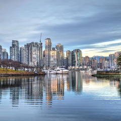 Sunset at city harbor. False Creek from Granville Island. Yaletown. Vancouver. British Columbia. Canada.