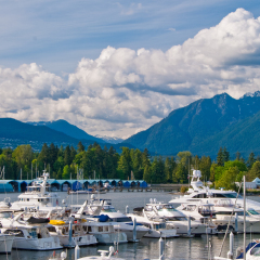 View over Coal Harbor marina and Stanley Park in Downtown of Vancouver, Canada.