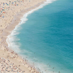 Scenic View Of Beach With Many People