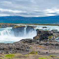 Godafoss waterfall, or waterfall of the gods - Northern Iceland. The water of the river Skjalfandafljot falls from a height of 12 meters over a width of 30 meters.