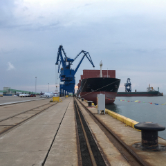 Bulk cargo ship loading goods at the Port of changxing island, north of Dalian city,China. 