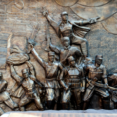 Sculpture on the wall in front of the Taierzhuang Battle Memorial Hall, May 14th 2011, Zaozhuang, Shandong, China.