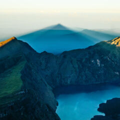 Crater of Mount Rinjani and its shadow.