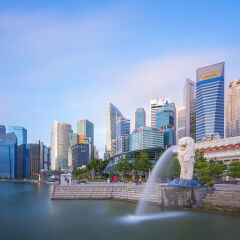 The Merlion statue fountain, iconic symbol of Singapore, looking from the Marina Bay waterfront. Merlion fountain is the most famous tourist attraction in Singapore.