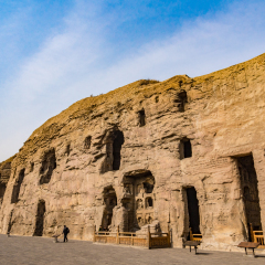 DATONG, CHINA - FEBRUARY 21, 2014: Yungang Grottoes in Datong, China. The Yungang Grottoes is a UNESCO World Heritage Site.