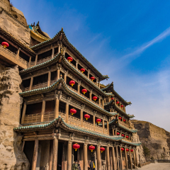 DATONG, CHINA - FEBRUARY 21, 2014: Yungang Grottoes in Datong, China. The Yungang Grottoes is a UNESCO World Heritage Site.