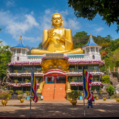 Big Golden Buddha Temple of Dambulla a UNESCO heritage site. Buildings and attractions of Sri Lanka.