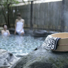 Two women soaking in hot spring