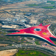 ABU DHABI, UNITED ARAB EMIRATES - MAY 23, 2013: Aerial view of Ferrari World Park is the largest indoor amusement park in the world.