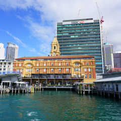 AUCKLAND, NEW ZEALAND -5 AUG 2018- View of the landmark Auckland Ferry Terminal (ferry building), a ferry hub in the Central Business District of Auckland and the Waitematā Harbour, New Zealand.
